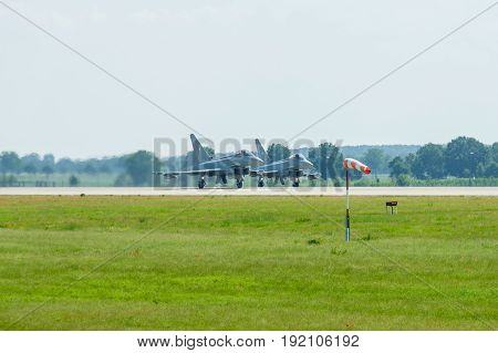 BERLIN GERMANY - JUNE 03 2016: Preparing for takeoff multirole fighter Eurofighter Typhoon. Exhibition ILA Berlin Air Show 2016