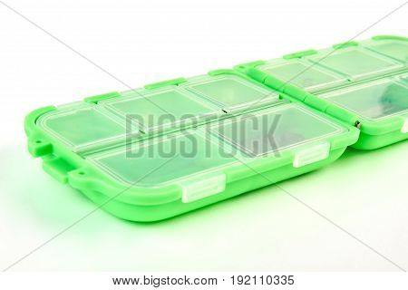Fishing tackle box isolated. Plastic box for fishing.