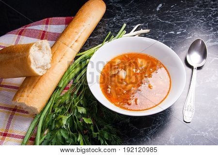Vegetables And Meat In Red Beetroot Soup Or Borsch In White Plate On Dark Marble Background.