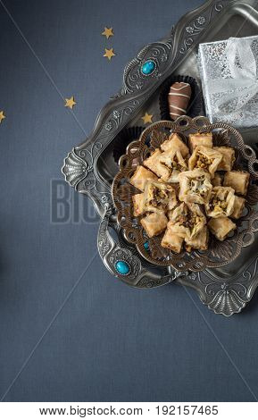 Assorted delicious Baklava sweet served in an ornamental tray. Special sweet treat and gifts on the occasion of Eid festival.