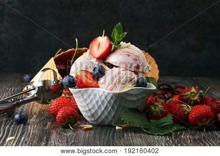 Strawberry Ice Cream In White Bowl With Fresh Strawberries And Blueberries