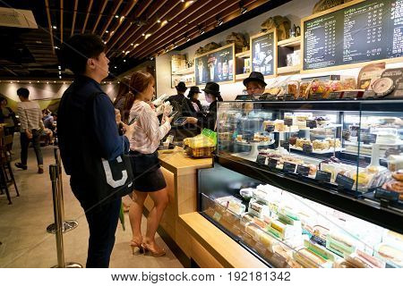 SEOUL, SOUTH KOREA - CIRCA MAY, 2017: display case at Starbucks in Seoul. Starbucks Corporation is an American coffee company and coffeehouse chain.