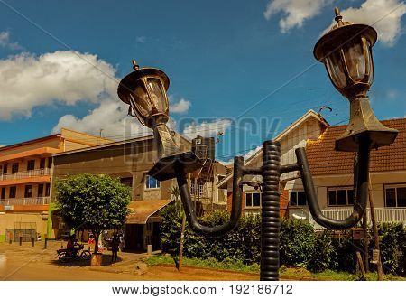 Iron lanterns under the blue African sky