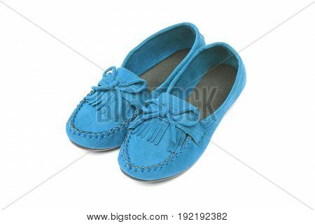 A pair of red moccasins isolatedb on white