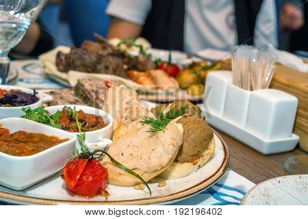 Variety of pate and suace on a plate