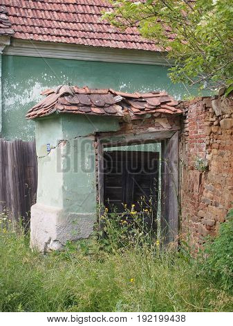 A broken hous in a deserted village.