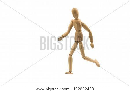 running wooden man puppet on white background