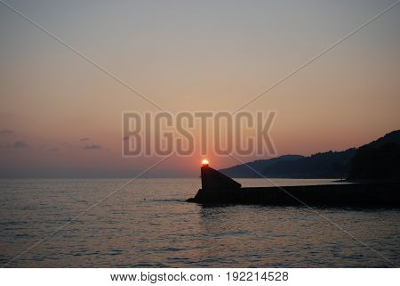 Sunset above mountains around sochi fisherfolk black see