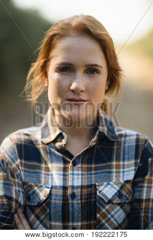 Close up portrait of beautiful young woman at farm 