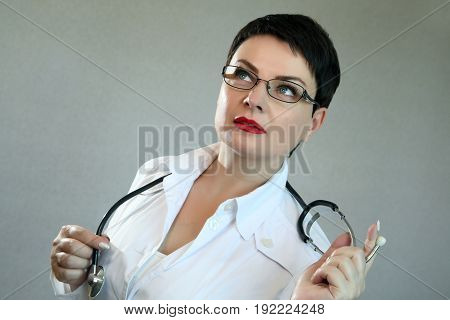 Portrait of a beautiful and sexy female doctor in a hospital.