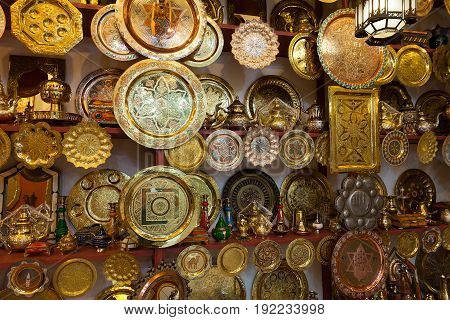 Street shop with traditional plates in Marrakech Morocco at night