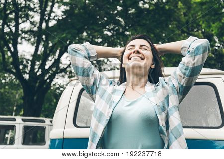 woman injoy her trip on van even in rainy weather