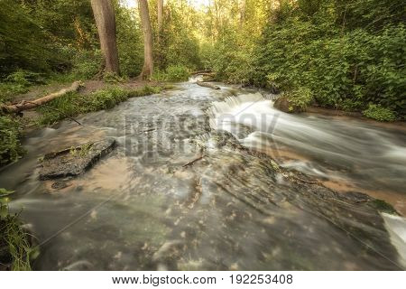 Roztocze (Roztochia) National Park. Cascades on Sopot river. Czartowe Pole (Devil's Field) reservation.