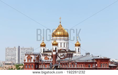 Moscow, Russia - May 15, 2016: Cathedral of Christ the Savior house on the New Arbat and confectionery manufacturer 