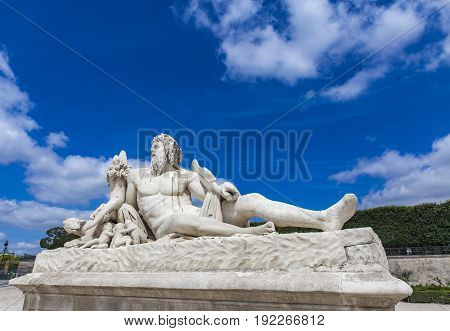 Statue Le Tibre In Tuileries Garden In Paris