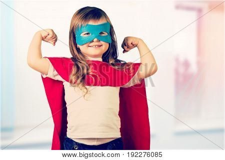 Girl in costume superhero elementary age preadolescent child fun