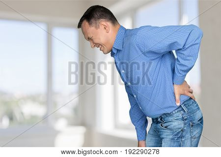 Man back pain feel man face blue years