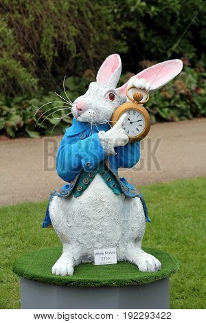 Wisley, Surrey, Uk - April 30 2017: Garden Ornament Or Statue Of The White Rabbit From 