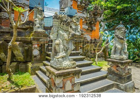 BALI, INDONESIA - MARCH 05, 2017: Stoned statue in the enter of Pura Ulun Danu Bratan temple on Bali island, Indonesia.
