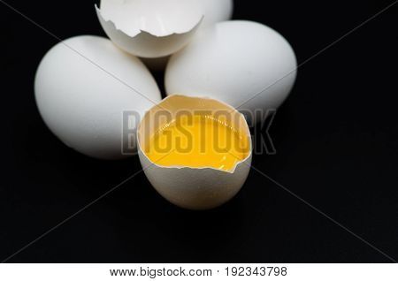 Fresh Eggs On The Black Background