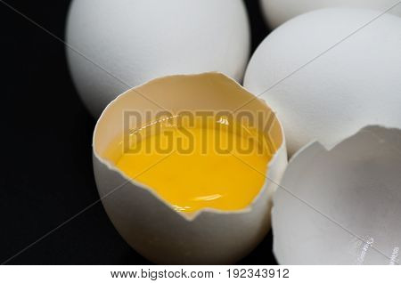 Fresh Eggs On The Black Background