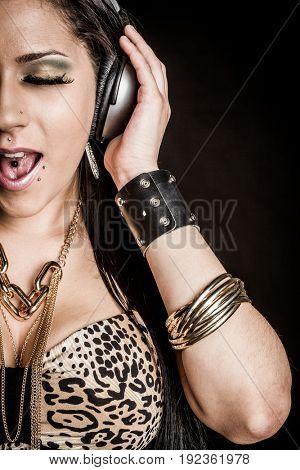 Beautiful young headphones singing woman