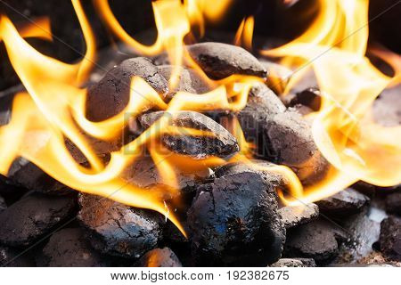 black burned charcoal bbq grid fire natural as background.