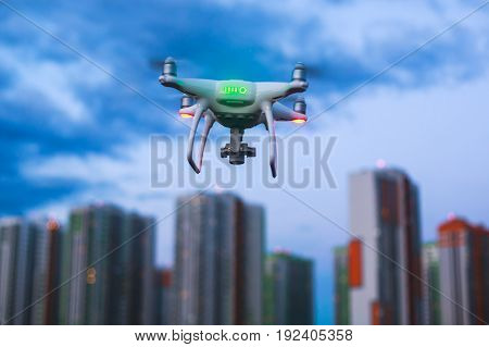 A process of launching the quadcopter drone with camera, operator pilot launches quadcopter uav, unmanned aerial vehicle flying