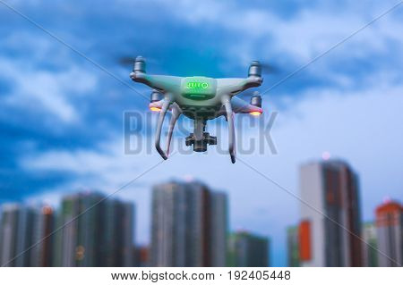 A process of launching the quadcopter drone with camera, operator pilot launches quadcopter uav, unmanned aerial vehicle flying