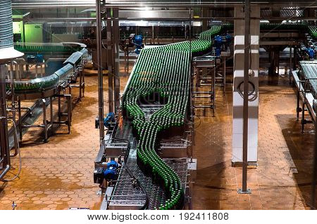 Bottling equipment with greed bottlles on line