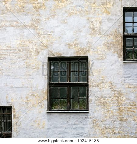 Shabby Facade Of Old House In Riga City