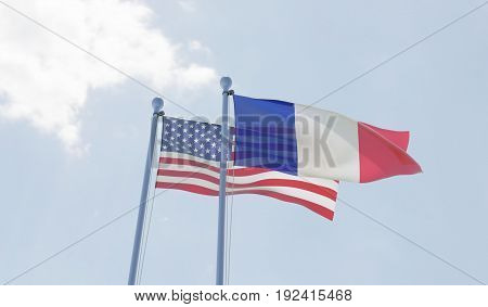 USA and France, two flags waving against blue sky. 3d illustration