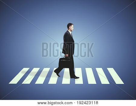 Side view of businessman wth briefcase walking on crosswalk. Purple background