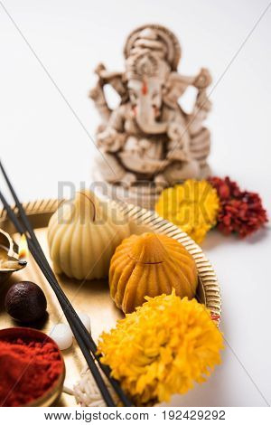A modak is an Indian sweet dumpling popular in many parts of India. It is called modak in Marathi and Konkani as well as Gujarati language, Kozhakkatta in Malayalam, modhaka or kadubu in Kannada