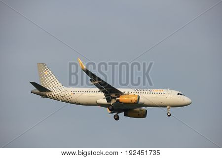 Amsterdam the Netherlands - June 22nd 2017: EC-LZF Vueling Airbus A320 approaching Polderbaan runway at Schiphol Amsterdam Airport the Netherlands