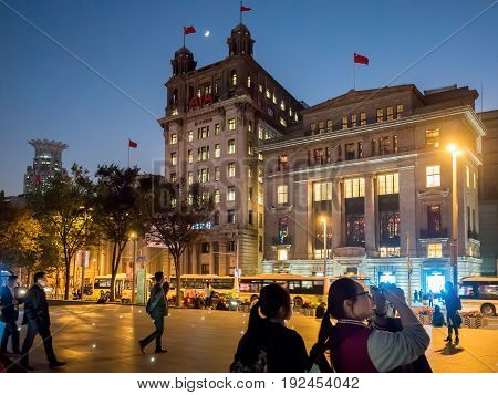 Shanghai, China - Nov 4, 2016: View of North China Daily News (AIA - American Insurance Association) building by night. Along The Bund on Zhongshan East 1st Road.