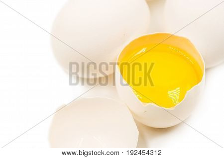 fresh eggs with yellow yalk on the black background