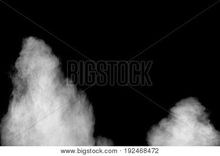 white Powder explosion on black background. White dust explode.