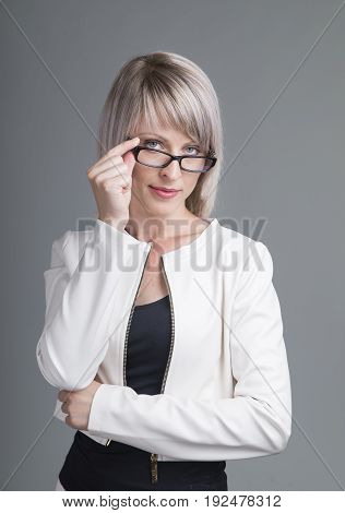 Portrait of elegantly dressed young gorgeous brunette woman