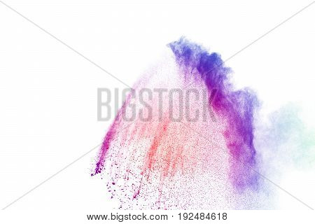 abstract multicolored powder splatted on white backgroundFreeze motion of color powder exploding