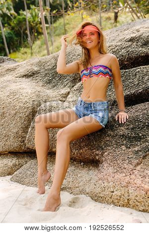 Beautiful Woman On Big Stone In Tropics.