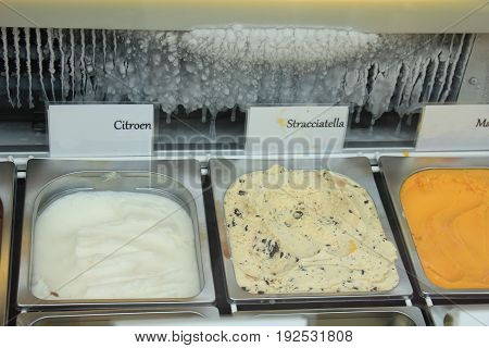 Assorted ice cream flavours on display in a shop