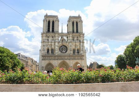 PARIS, FRANCE - JUNE 5, 2017: Notre Dame de Paris, medieval catholic cathedral in Paris, France.  Beautiful view of french gothic architecture, one of the most famous church building in the world.