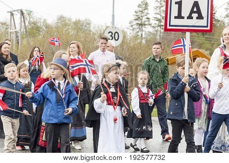 VERDAL NORWAY - MAY 17 2017: National day in Norway. Norwegians at traditional celebration and parade on may 17 2017 in Verdal. People on parde before school in Verdal. Constitution Day is the National Day of Norway.