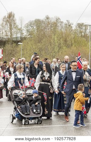 VERDAL NORWAY - MAY 17 2017: National day in Norway. Norwegians at traditional celebration and parade on may 17 2017 in Verdal. People on parde before school in Verdal. Constitution Day is the National Day of Norway.