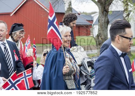 VERDAL NORWAY - MAY 17 2017: National day in Norway. Norwegians at traditional celebration and parade on may 17 2017 in Verdal. People on parde before school in Verdal. Constitution Day is the National Day of Norway.
