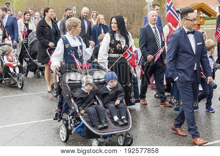 VERDAL NORWAY - MAY 17 2017: National day in Norway. Norwegians at traditional celebration and parade on may 17 2017 in Verdal. People on parde before school in Verdal. Constitution Day is the National Day of Norway.