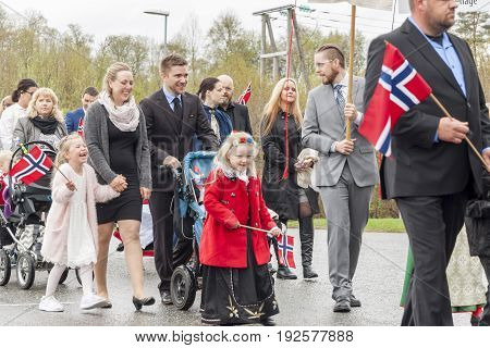 VERDAL NORWAY - MAY 17 2017: National day in Norway. Norwegians at traditional celebration and parade on may 17 2017 in Verdal. People on parde before school in Verdal. Constitution Day is the National Day of Norway.