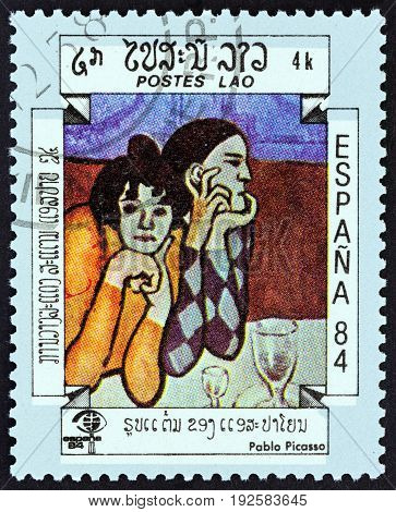 LAOS - CIRCA 1984: A stamp printed in Laos from the "International Stamp Exhibition Espana '84, Madrid, Spain " issue shows Two Harlequins (Pablo Picasso), circa 1984.