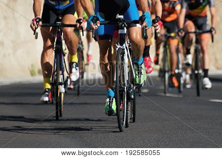 Cycling competition,cyclist athletes riding a race at high speed